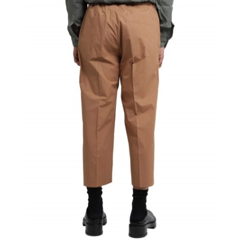 CostumeIn brown trousers