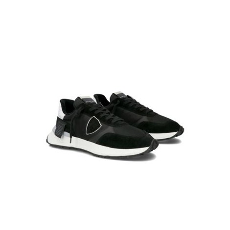 Sneakers ANTIBES di Philippe Model, da uomo, colore nero. Modello con tomaia in pelle di vitello colore nero. Parte posteriore con logo e suola a contrasto. Caratterizzato dal logo scudetto sul lato della scarpa. 