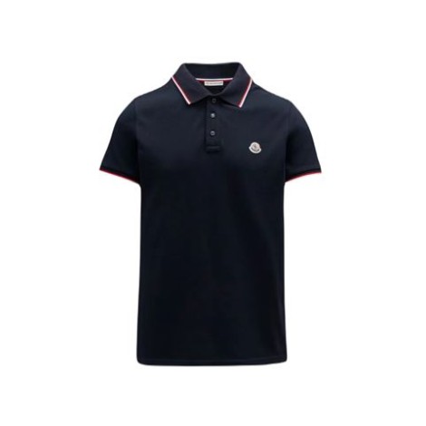 Polo di Moncler, da uomo, colore blu. Modello a maniche corte, realizzato in piquet di cotone. Caratterizzato da dettaglio logo in tessuto e polsi e collo tricolore. Colletto classico con tre bottoni. Vestibilità regolare. 