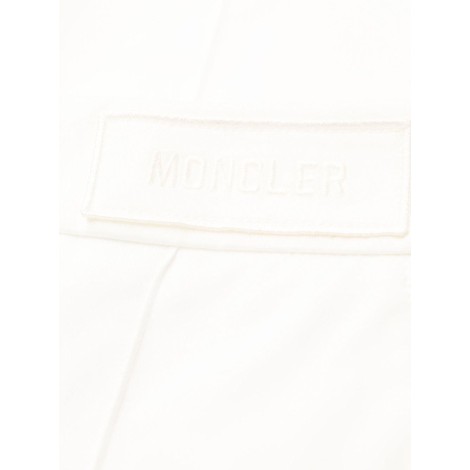 MONCLER pantaloni affusolati in cotone bianco con pieghe