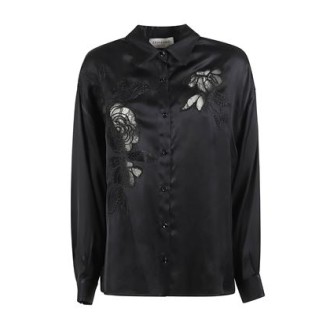 Camicia di Ermanno Firenze, da donna, colore nero. Modello caratterizzato da ricamo. Chiusura frontale con bottoni. 