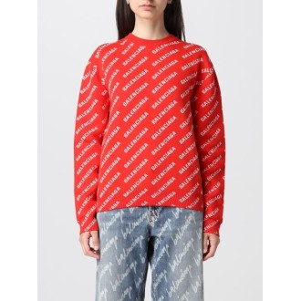 Maglione rosso Balenciaga interamente logato per le feste