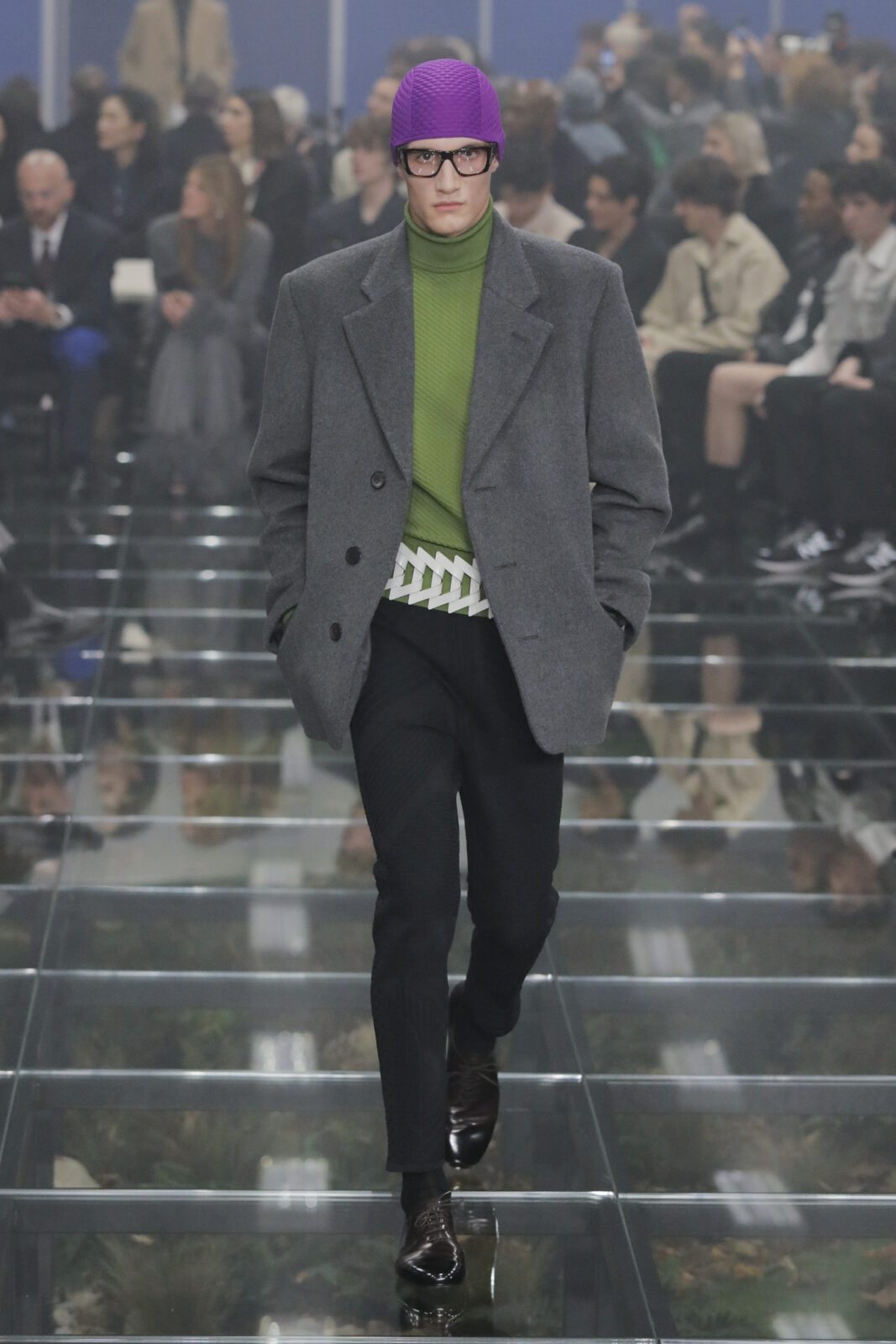Prada fall winter look with fitted cap and brightly colored coat