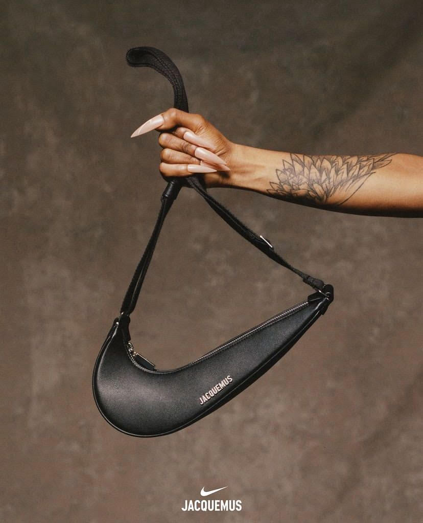The Swoosh Bag held in the Jacquemus x Nike social campaign