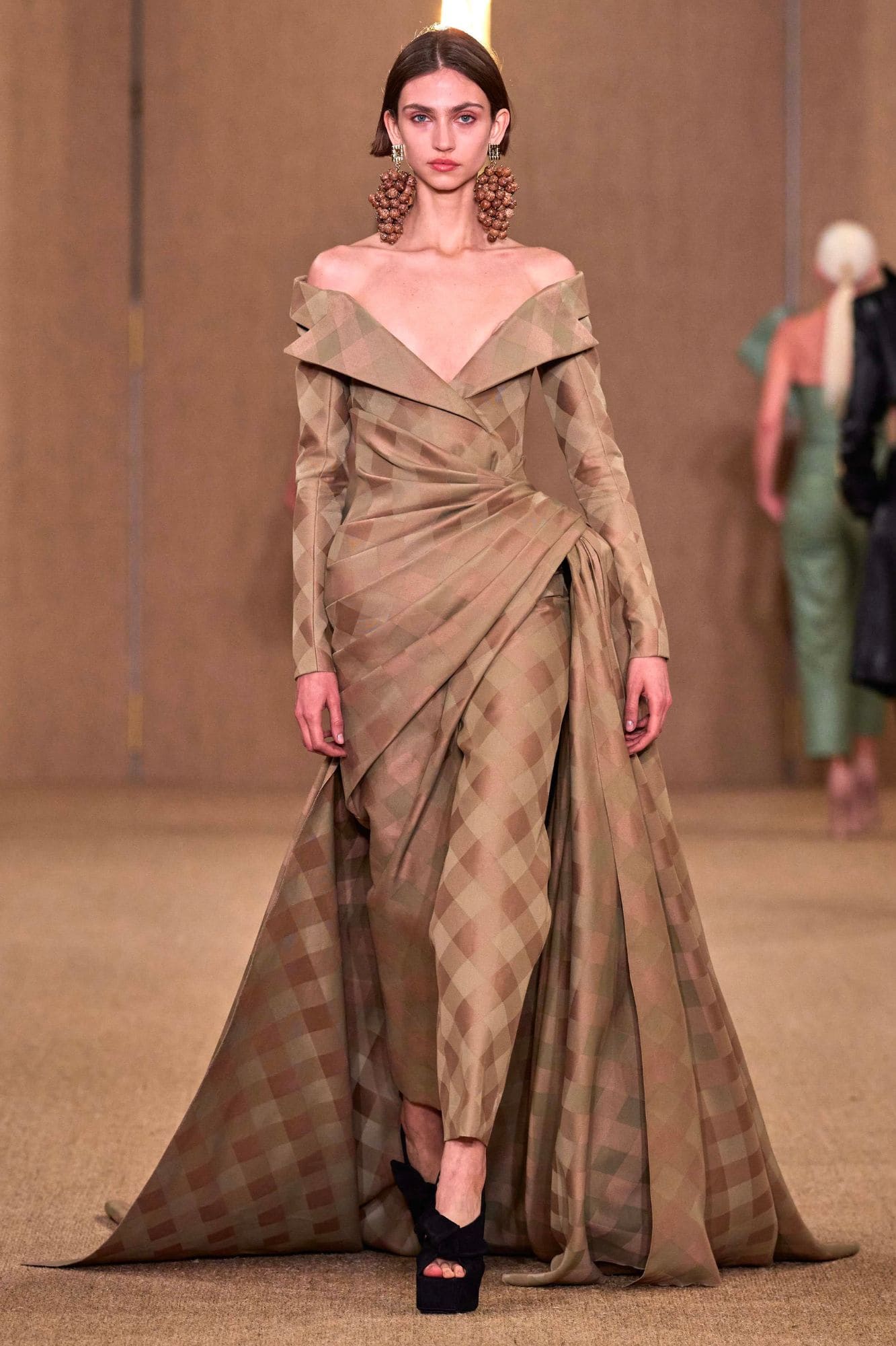 Balmain dress with grape cluster motifs on the runway