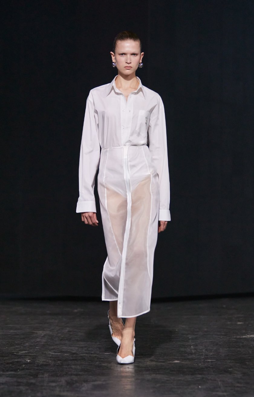 Coperni model in a sheer white astronaut-style onesie