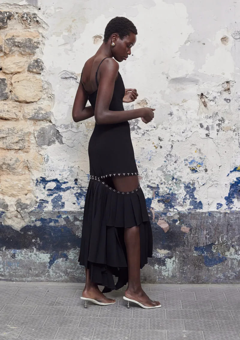 Model in a deconstructed suit from the Rokh x H&M capsule