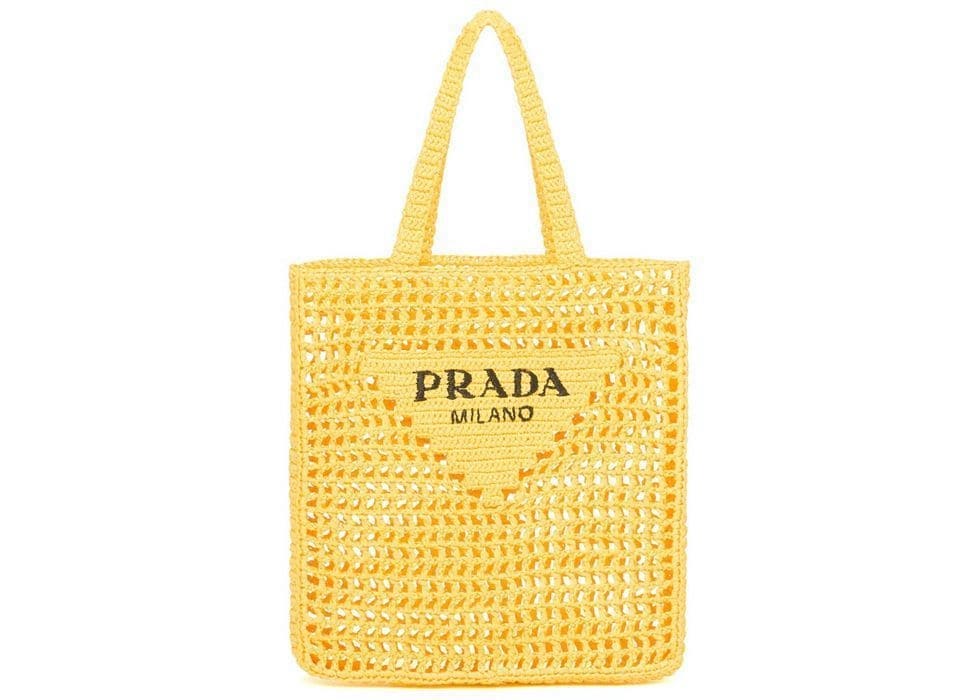Borsa di paglia di lusso con dettagli raffinati in pelle