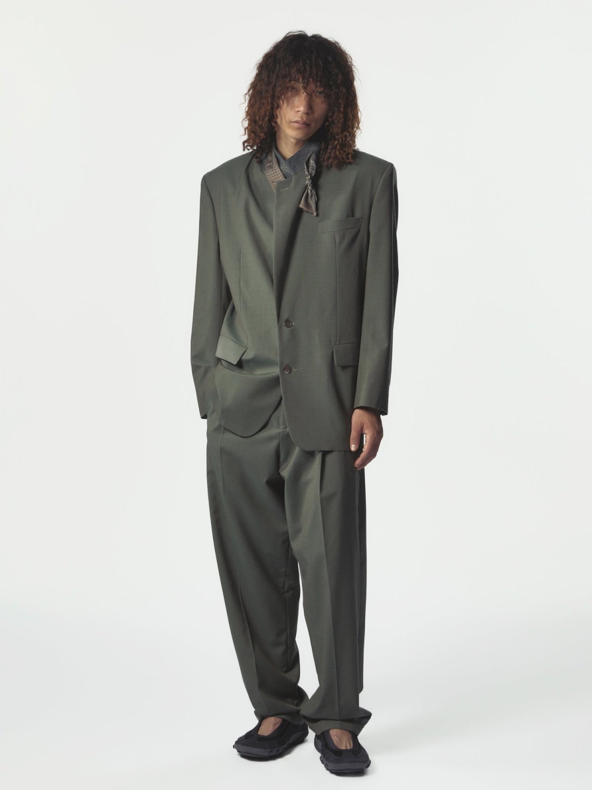 Magliano, Dawn Rimini suit in sage green, official e-commerce campaign