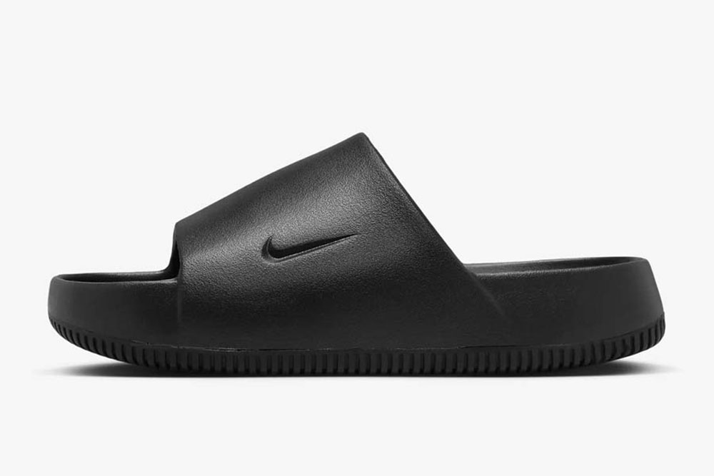 Nike Calm Slide dal design minimalista viste di lato