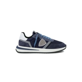 Sneakers TROPEZ 2.1 di Philippe Model, da uomo, colore blu. Modello  con tomaia in pelle di vitello colore blu. Parte posteriore e logo a contrasto. Caratterizzato dal logo scudetto sul lato della scarpa. 