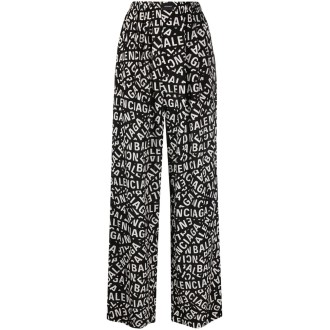 BALENCIAGA Pantaloni comodi in seta nera con logo Balenciaga bianco all over