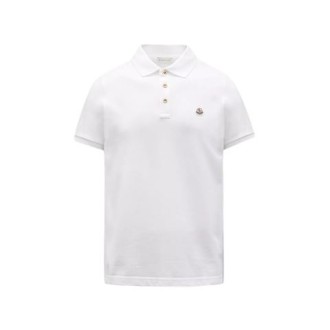 Polo di Moncler, da uomo, colore bianco. Modello a maniche corte, realizzato in piquet di cotone. Caratterizzato da dettaglio logo in tessuto e polsi e collo lavorati a costine. Colletto classico con tre bottoni. Vestibilità regolare. 