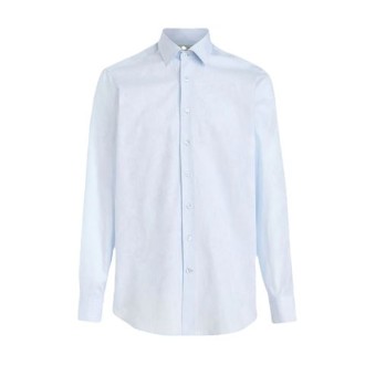 Camicia di Etro, da uomo, colore azzurro. Modello a maniche lunghe, realizzato in cotone jacquard. Caratterizzato da motivi Paisley tono su tono, colletto classico e chiusura con bottoni. Polsini con bottone. Vestibilità slim. 