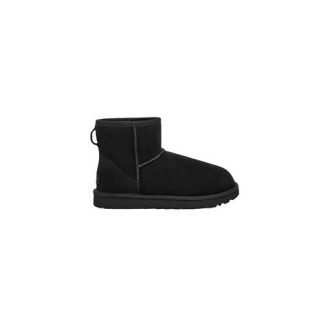 Stivale Classic Mini II di UGG colore nero  in montone rovesciato e pelle scamosciata pretrattato per resistere a umidità e macchieListino posteriore , cuciture overlock, soletta in vello di pecora e suola Treadlite by UGG™.   