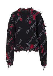 BALENCIAGA Maglione in lana nera con dettagli stracciati rossi